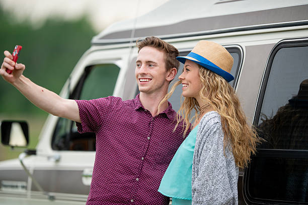 istock Couple Taking a Selfie Together During a Road Trip Adventure 2222619596