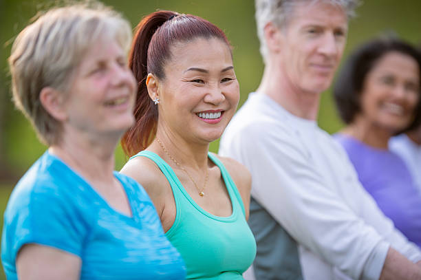 istock Group of Seniors Smiling During Outdoor Exercise Session 2222620580