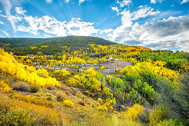 istock Gilman, Eagle county Colorado abandoned mining town, mine for lead zinc silver in autumn fall foliage of aspen trees landscape mountains view 2222628696