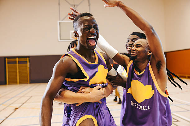 istock Final buzzer joy: Men's basketball team celebrates hard-earned win 2222629134