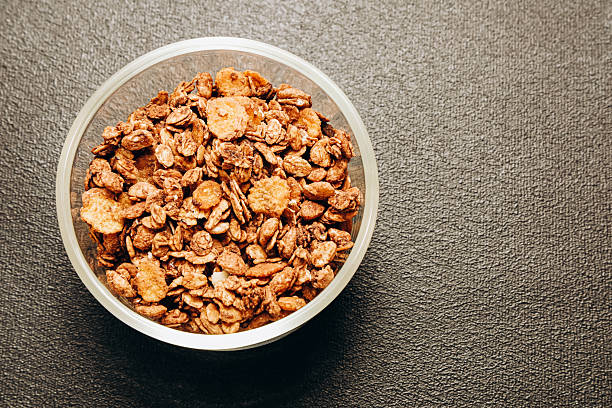 istock Healthy granola blend in a transparent bowl on a dark surface for nutritious breakfast ideas 2222629260