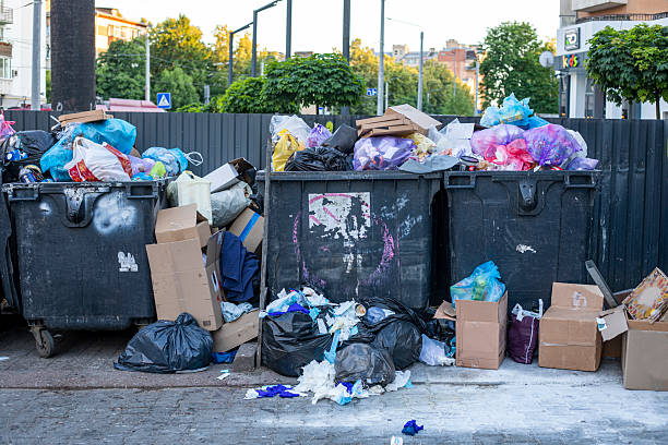 istock garbage bins and garbage bags nearby. environmental protection. Recyclables 2222637196