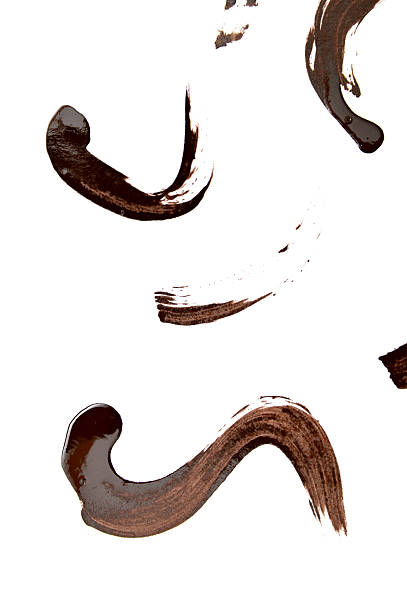 istock chocolate sauce isolated on white background 2222638692