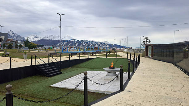 Ushuaia, Argentina, April 04, 2025: Islas Malvinas Square located on the city's waterfront. The monument was declared public and national by law 25384 published on 01/09/2001