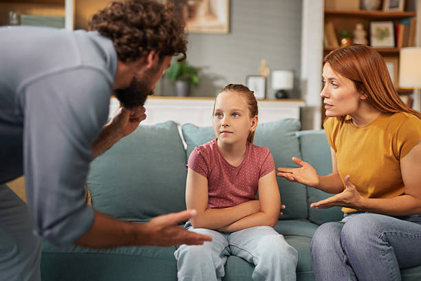 istock Parents scolding daughter at home after misbehavior 2222655003
