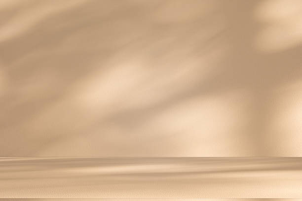istock Studio style background wall decoration presentation uses white and beige tones. with shadows cast from a nearby window, concept creating a decorative 2222676649