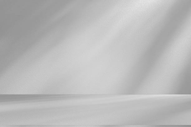 istock Wall interior background, studio and backdrops show products.with shadow from window color white . background for text insertion and presentation product 2222676663