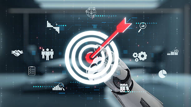 istock Futuristic Robot Hand Targeting Bullseye with Digital Interface Symbols Representing Precision and Technology in Modern Business Environment. Auvana 2222678443