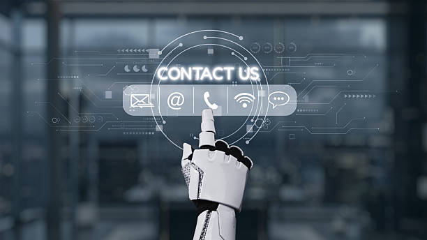 istock Futuristic robotic hand reaching for contact options amidst a high-tech digital background in a modern office environment. Auvana 2222678603