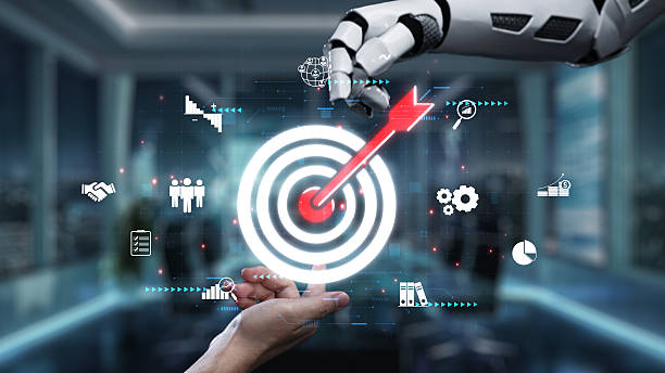 istock Innovative Technology in Business Strategy with Robotic Hand Targeting Goals and Analytics in Modern Office Environment. Auvana 2222678809