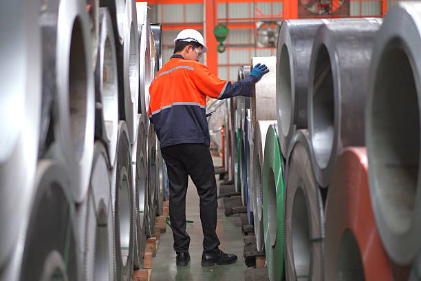 istock Factory engineer walking around and inspecting the machines. 2222683217