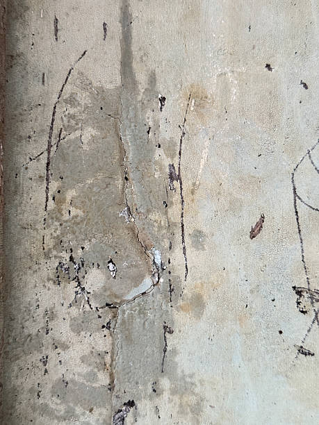 istock A wall with a lot of scratches and marks on it 2222685631