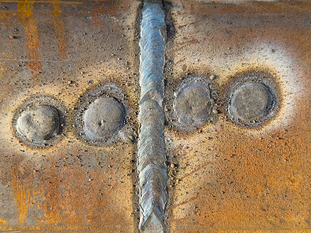 istock A close up of a rusty metal object with four holes in it 2222685741