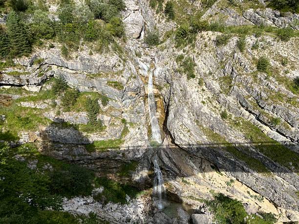 istock Waterfall Mangart or Mangartski waterfall, Log pod Mangartom (Triglav National Park, Slovenia) - Wasserfall Mangart oder Mangartfall (Triglav-Nationalpark) - Mangartski slap (Triglavski narodni park, Slovenija) 2222685896