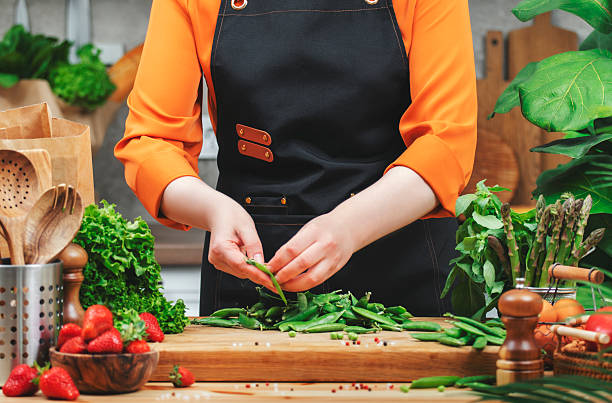 istock Healthy vegan cooking with fresh vegetables in a modern kitchen 2222688603