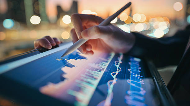 istock Close-up investing women focusing on working on machine learning AI lgorithms. the setting highlights flexibility in ai development, blending finacial tech and AI to easy invesment 2222690694