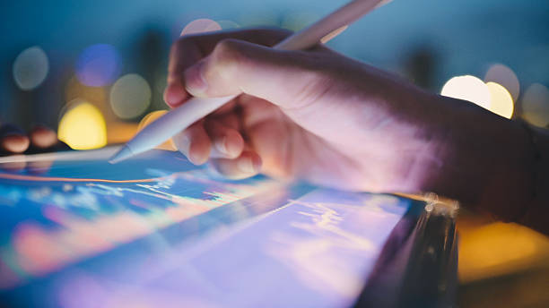 istock woman holding digital tablet showing real-time ai analytics for decision support interacts with live ai-generated data on a tablet, reinforcing themes of personal data empowerment 2222690796