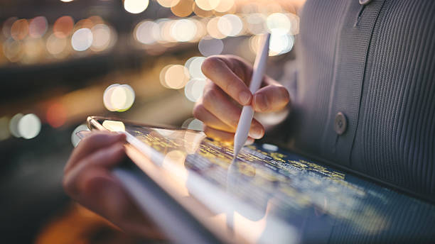 istock Global investor coding business AI tools on a digital tablet  showcasing the creation of software solutions for enterprisesuse of AI in business 2025 2222690807