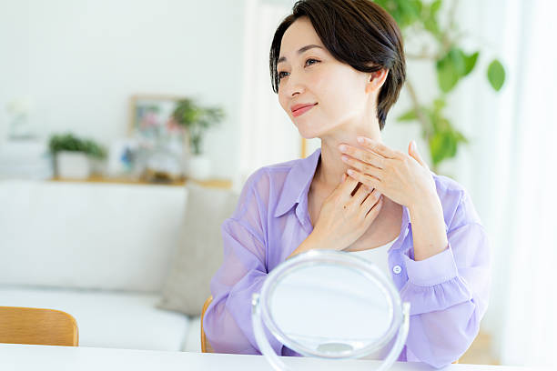 istock A middle-aged woman doing skin care 2222692498