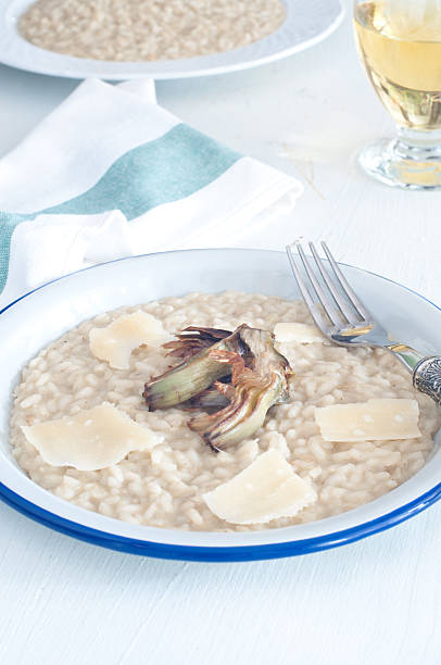 istock Italian risotto with artichokes and parmesan 2222703528