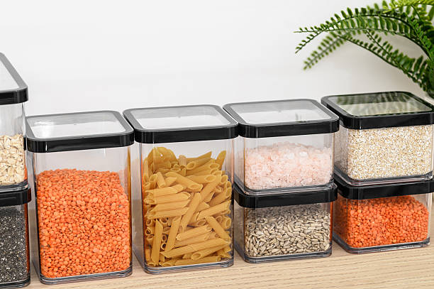 istock Plastic hermetically sealed containers for loose products stand on a shelf in the kitchen 2222704554
