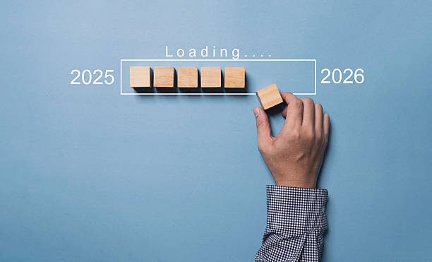 istock marked “Loading…” between the years 2025 and 2026, symbolizing transition, planning, and progress into the new year concept. 2222711559