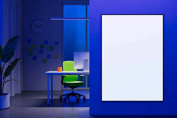 istock Modern office interior with blank poster mockup on blue wall for advertising or design presentation concept in clean bright workspace.. 3D Rendering 2222711862