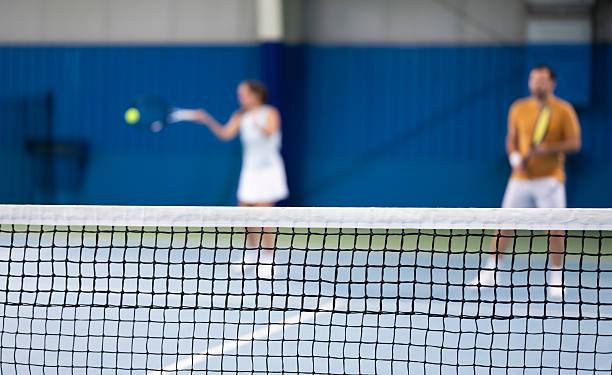 istock Tennis Players Playing Competitive Double Match 2222712182