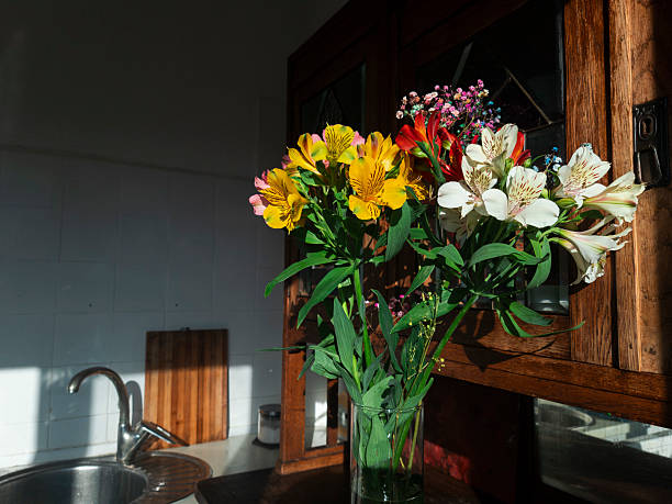 istock Colorful Alstroemeria Bouquet Illuminating Rustic Kitchen 2222724234