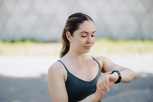 istock Athlete woman runner checking smart watch 2222726200
