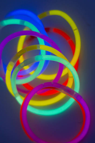 istock neon bracelets glow sticks in the dark 2222730522