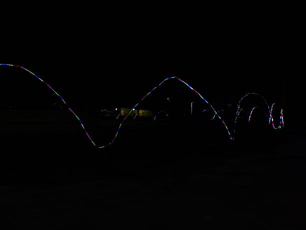 istock Abstract Multicolored Light Trail in the Dark Night Sky 2222732688