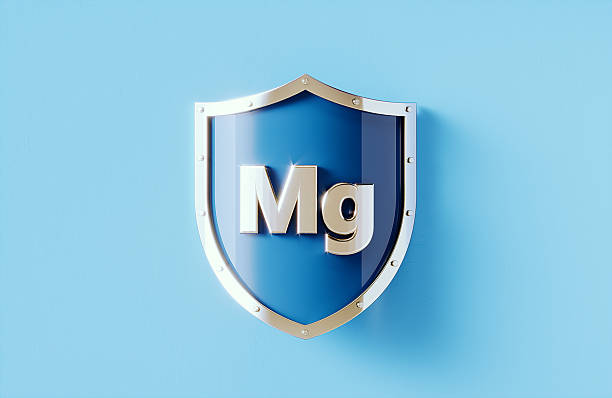 istock Mg (Magnesium) Written Blue Shield On Blue Background - Healthy Lifestyle Concept 2222732848
