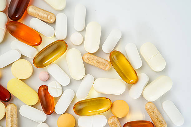istock vitamin supplements capsules pill, softgel, fish oil, omega 3, vitamin E 2222734227