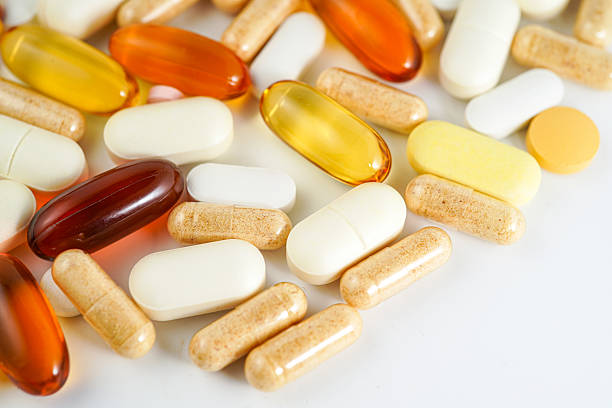 istock vitamin supplements capsules pill, softgel, fish oil, omega 3, vitamin E 2222735319