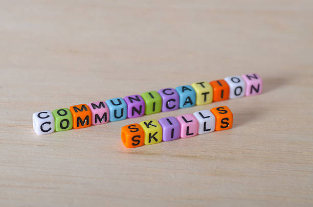 istock Communication Skills Concept with Beads on Wooden Surface  Emphasizing Soft Skills in Modern Work Culture 2222739313