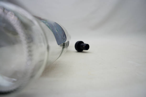 istock Various glass bottles of different colors and sizes 2222745121