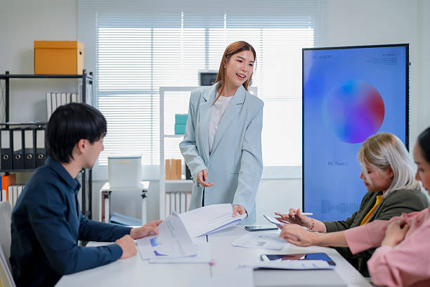 istock Forward-thinking business leaders gather in a digital strategy session enhanced by intelligent AI note-takers, optimizing workflow automation, boosting team synergy, and capturing actionable outcomes 2222747820