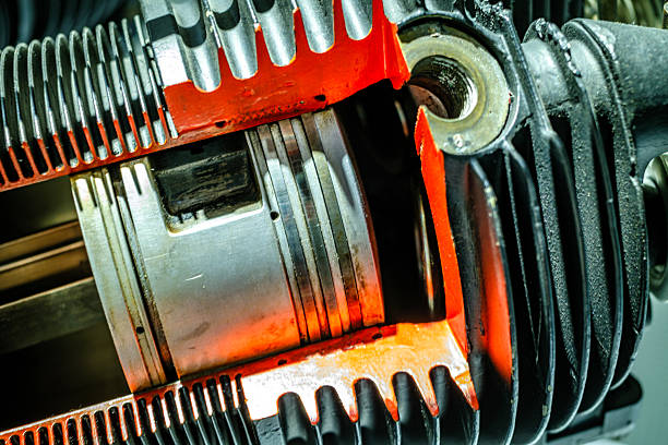 A conceptual electric car motor on dark gradient background, created in 3D. Close-up of an electric engine and its different parts.