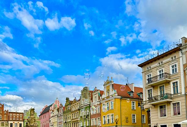 Soap bubbles in Old Market Place in the center and oldest part of Old Town of Poznan. Old Town Hall, merchants’ houses from the 16th century, and water fountains  depicting Apollo, Neptune, and Mars are located in the square.