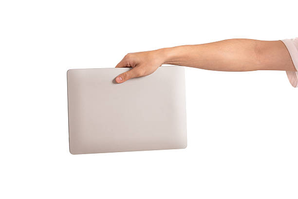 istock Hand holding laptop computer isolated on white background. High quality studio shot. Concept for technology, business, finance and advertising. 2222749497