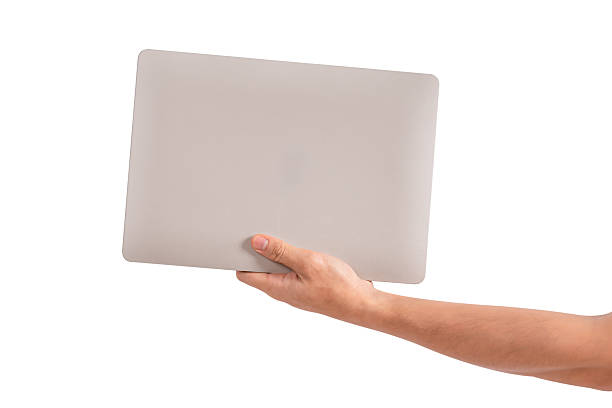 istock Hand holding laptop computer isolated on white background. High quality studio shot. Concept for technology, business, finance and advertising. 2222749499