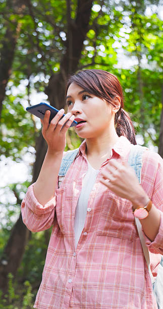 istock woman mobilephone AI assistant hike 2222750152