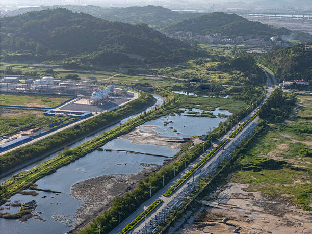 istock Industrial landscape, green spaces, and highways 2222751872