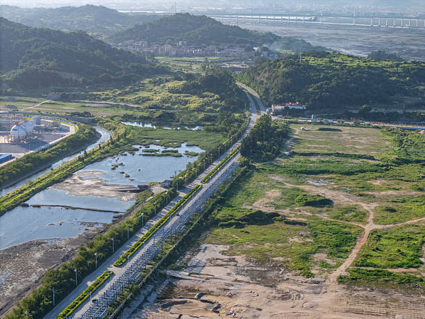 istock Industrial landscape, green spaces, and highways 2222751877