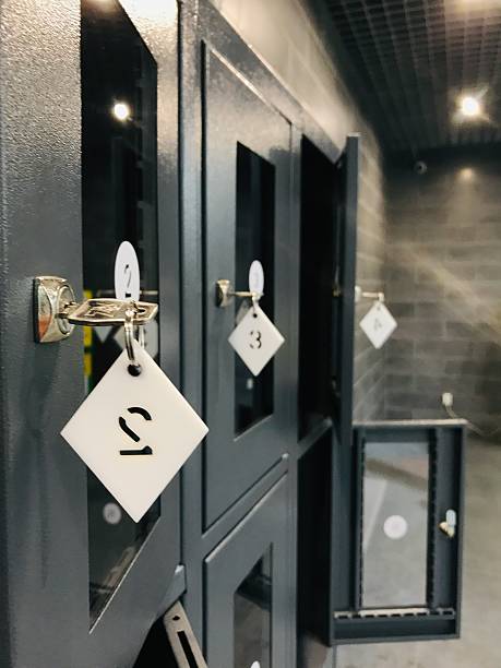 istock Lockers in a modern storage area with open doors displaying contents 2222753991