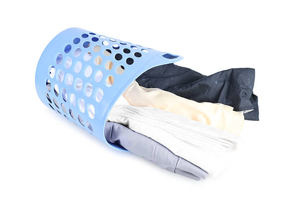 Dirty laundry hamper isolated on white.