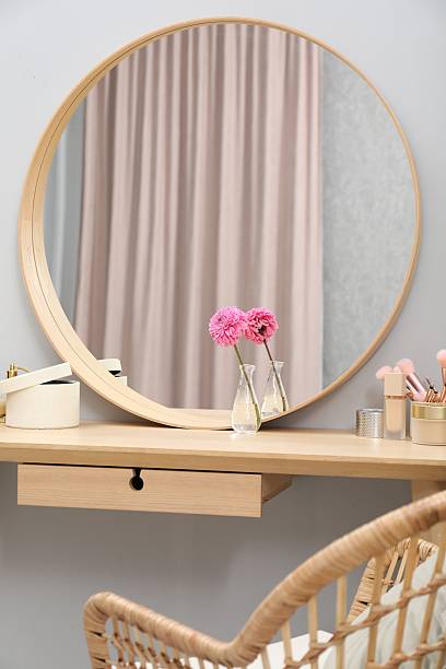 istock Mirror, dressing table and chair indoors. Interior design 2222754959