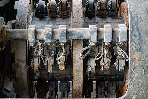 istock interior of an old, dusty electrical device with visible coils, terminals, and wires. Components show signs of corrosion and wear, typical of abandoned industrial installations. 2222756197
