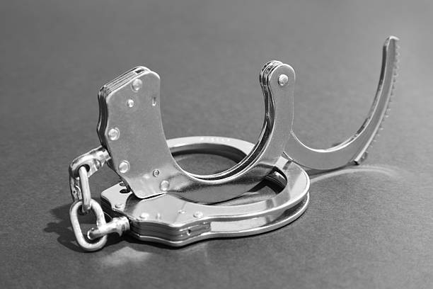 istock Classic chain handcuffs on grey background, closeup 2222756240